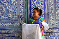 77Khi Woman Selling shawls