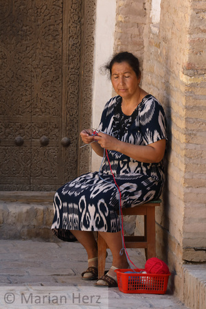 57Khi Woman Knitting