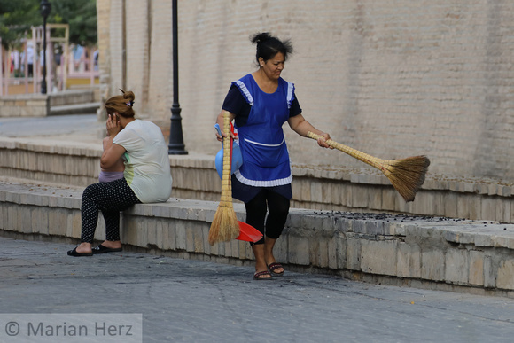 202Buk Woman Sweeping